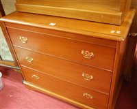 Lot 1486 - A modern Stag low three drawer chest, together...