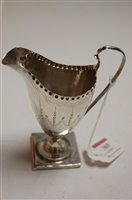 Lot 369 - A 19th century silver helmet shaped cream jug,...