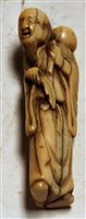 Lot 378 - A Japanese Meiji period ivory netsuke, carved...