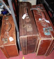 Lot 575 - Three early 20th century leather travel cases