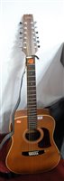 Lot 628 - A Japanese Aria acoustic guitar serial number...