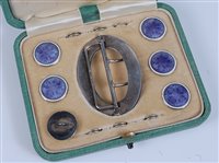 Lot 1150 - A cased set of silver and enamel buckle and...