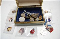Lot 546 - A small collection of assorted badges and...