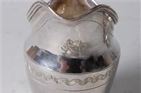Lot 1139 - A late Georgian silver cream jug, of helmet...