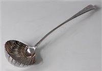 Lot 1133 - A George III silver soup ladle, in the Feather-...