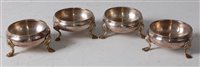 Lot 1142 - A pair of George II silver salts, of squat...