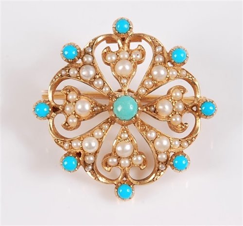 Lot 1154 - A turquoise and seed pearl brooch, the central...