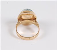 Lot 1161 - An aquamarine ring, the off round aquamarine...