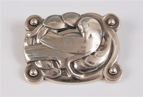 Lot 164 - *Georg Jensen (1866-1935) - a silver Dove...