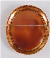 Lot 1206 - *A late 19th century cameo brooch, the oval...