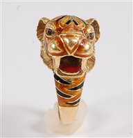 Lot 1193 - *An 18ct enamelled tiger ring, the...