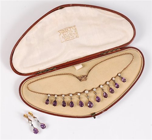 Lot 1152 - *A 15ct amethyst, diamond and pearl necklace,...