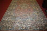 Lot 1564 - A Persian woollen deep-pile Tabriz carpet, of...