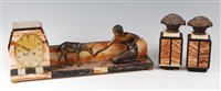 Lot 185 - A French Art Deco onyx and variegated marble...
