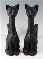 Lot 234 - A pair of unusual contemporary black painted...