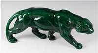 Lot 49 - An Art Deco glazed ceramic model of a prowling...