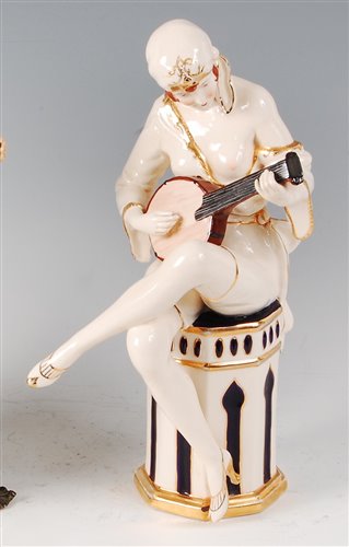 Lot 47 - Royal Dux - an Art Deco glazed pottery figure...