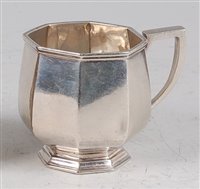 Lot 145 - An Art Deco silver christening mug, of plain...