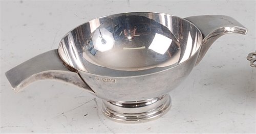 Lot 148 - A 1970s Scottish silver quaich, having pinched...