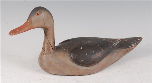 Lot 215 - An early 20th century painted wood decoy duck,...