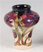 Lot 19 - A Moorcroft pottery vase in the Peony Posy...
