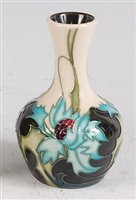 Lot 24 - A Moorcroft pottery vase in the Sea Holly...