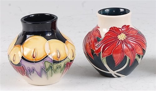 Lot 25 - A Moorcroft pottery squat vase in the Candle...