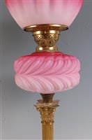 Lot 1276 - A late Victorian lacquered brass pedestal oil...