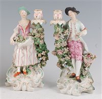 Lot 1094 - A pair of 18th century Derby porcelain figural...