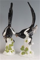 Lot 130 - A pair of circa 1900 Dresden porcelain magpies,...