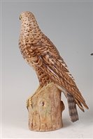 Lot 1 - A circa 1900 continental porcelain bird of...