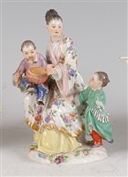 Lot 1099 - A Meissen porcelain figure of an Oriental...