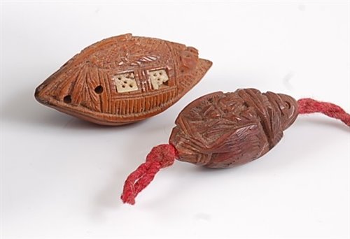 Lot 1303 - A Chinese peach stone carving as a junk boat,...