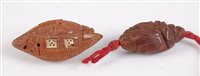 Lot 1303 - A Chinese peach stone carving as a junk boat,...