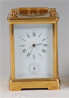 Lot 1543 - A French brass carriage clock, 20th century,...