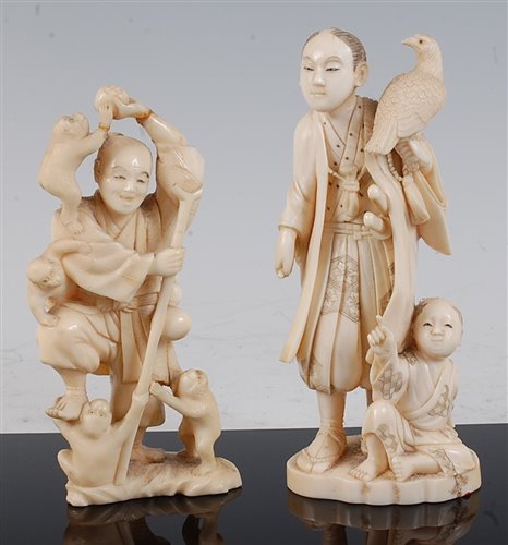 Lot 1321 - A Japanese Meiji period carved ivory okimono,...