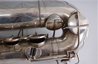 Lot 508 - A cased silver plated tenor saxophone, Martin...