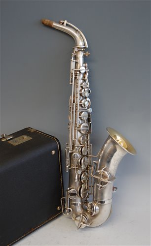 Lot 509 - A cased silver plated alto saxophone, Martin...