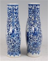 Lot 1310 - A pair of Chinese export moonflasks, each...