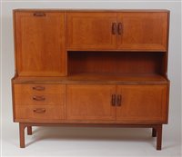 Lot 413 - A 1960s G-Plan teak side cabinet, having twin...