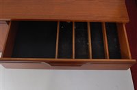 Lot 444 - A 1960s teak long sideboard, probably English,...