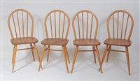 Lot 452 - A set of four 1960s Ercol blond elm and beech...