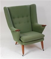 Lot 445 - A 1960s Danish pea-green fabric upholstered...