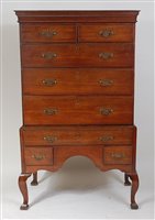 Lot 1620 - A George III oak chest-on-stand, having a...