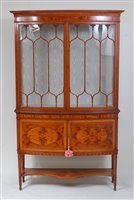 Lot 1640 - A circa 1900 satinwood and inlaid bowfront...