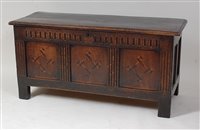 Lot 1635 - An early 18th century joined oak three-panel...