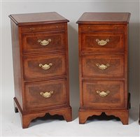 Lot 1638 - A pair of figured walnut bowfront bedside...