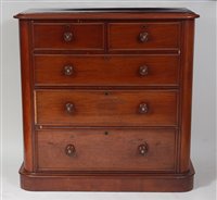 Lot 1628 - A Victorian mahogany round corner chest, of...