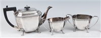 Lot 151 - An Art Deco silver three-piece tea set by...