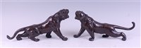 Lot 1319 - A pair of Japanese Meiji period bronze tigers,...